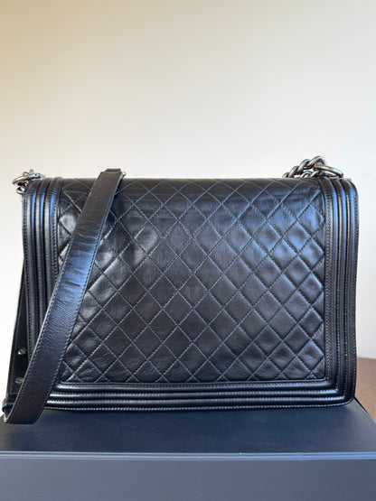 Pre-owned Chanel Boy Maxi Black Leather Flap Bag